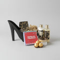 Luxe spa-cadeaupakket in decoratieve zwarte pump met vanillegeur producten